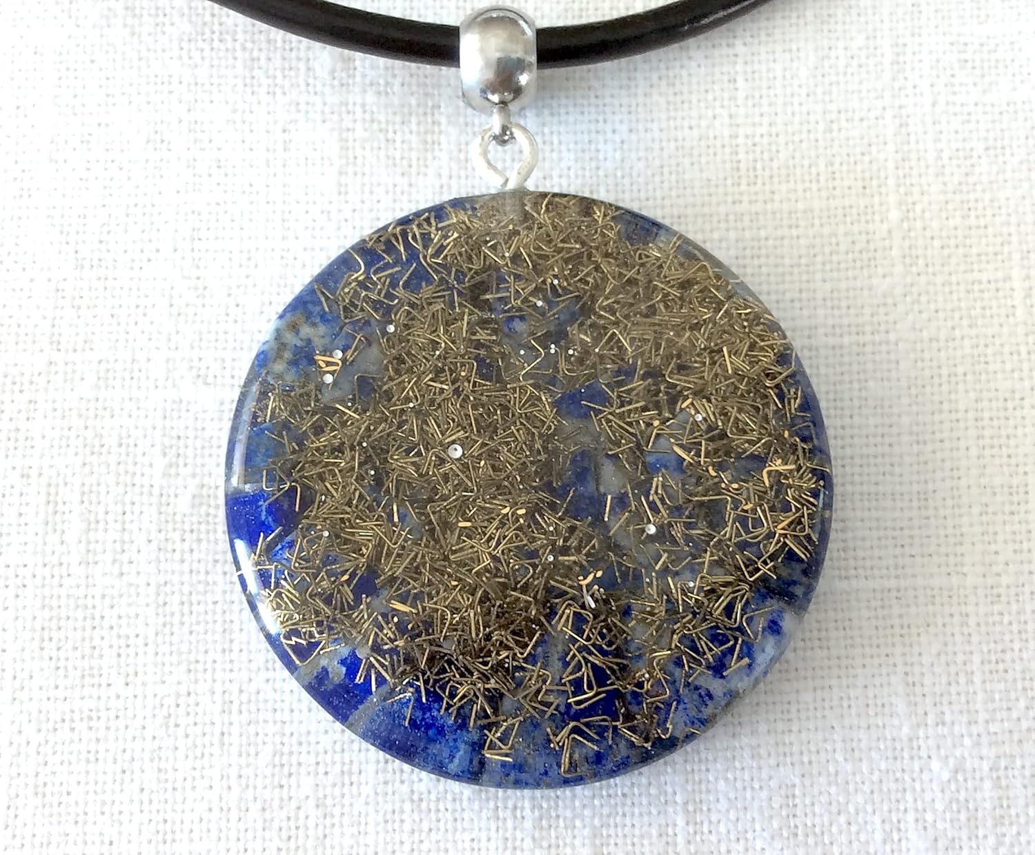 Orgone energy pendant necklace with Star of David Chai and Authentic Lapis Lazuli stones. 1.6 inch diameter. Made in USA