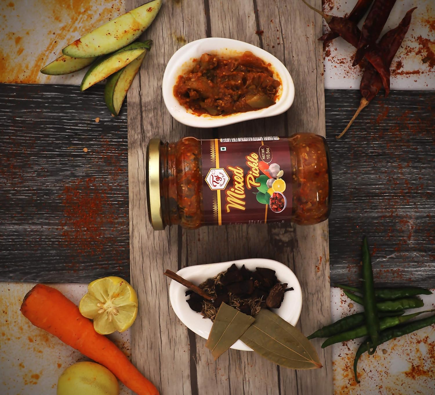 TAJ Pepinillo Mixto  Achar Mixto  Trozos de zanahoria con mango y lima  (10.58 oz)