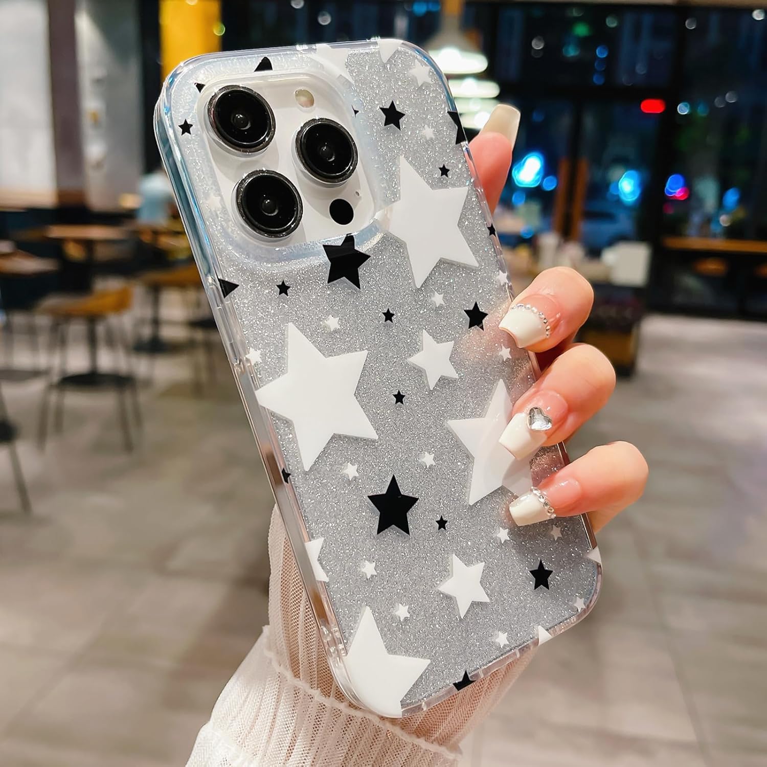 HYUEKOKO Funda compatible con iPhone 15 Pro con purpurina blanca y negra con estrellas para mujeres y niñas, funda delgada y dura para iPhone 15 Pro