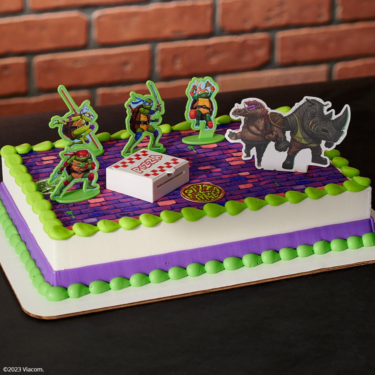 DecoSet Teenage Mutant Ninja Turtles Pizza Power Cake Topper, decoración de pastel de 6 piezas con figuras de tortuga, foto de pastel y lanzador de