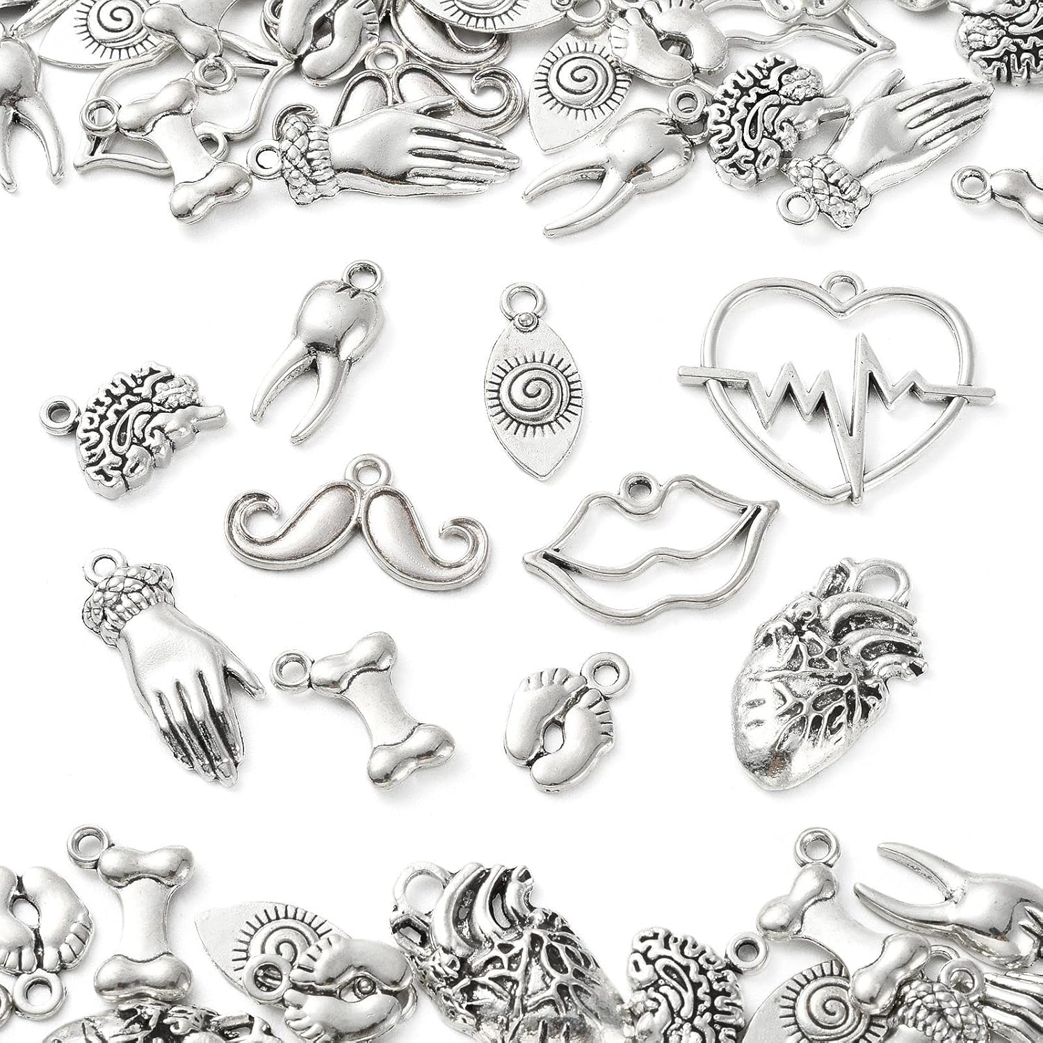 KitBeads 100 dijes tibetanos para partes del cuerpo, estilos mixtos, corazón, pie, hueso, diente, labio, cerebro, dijes de plata antigua para hacer