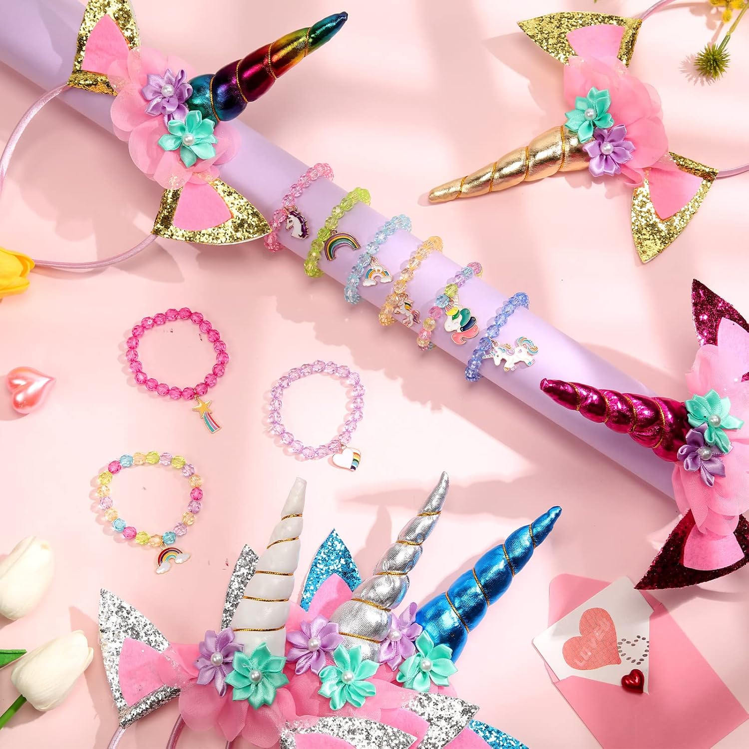 Jexine Los recuerdos de fiesta de unicornio de 18 piezas incluyen 9 diademas de unicornio y 9 pulseras de cuentas de arcoíris de unicornio, diadema