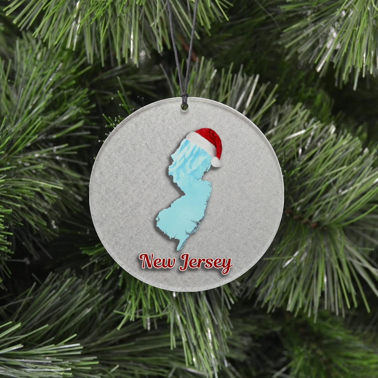 New Jersey Christmas Ornament – Winter Theme Featuring Snow, State Terrain Map and Santa Cap – 2024 Acrylic Tree Decoration – Holiday Gift and Home