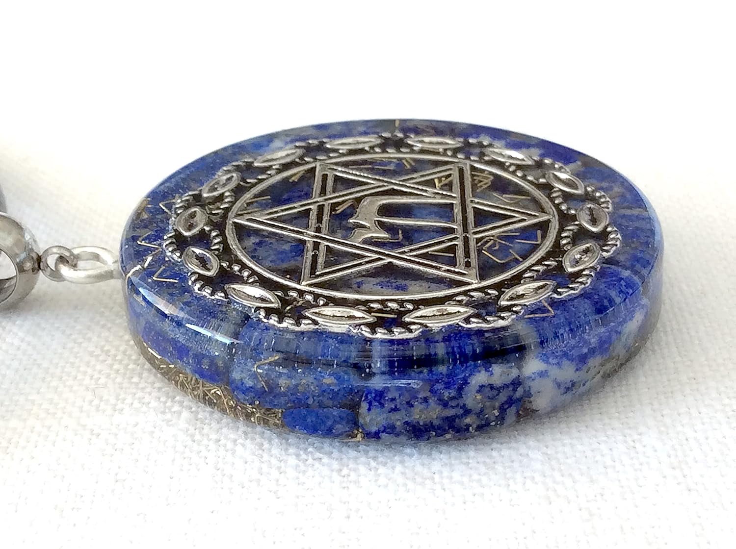 Orgone energy pendant necklace with Star of David Chai and Authentic Lapis Lazuli stones. 1.6 inch diameter. Made in USA