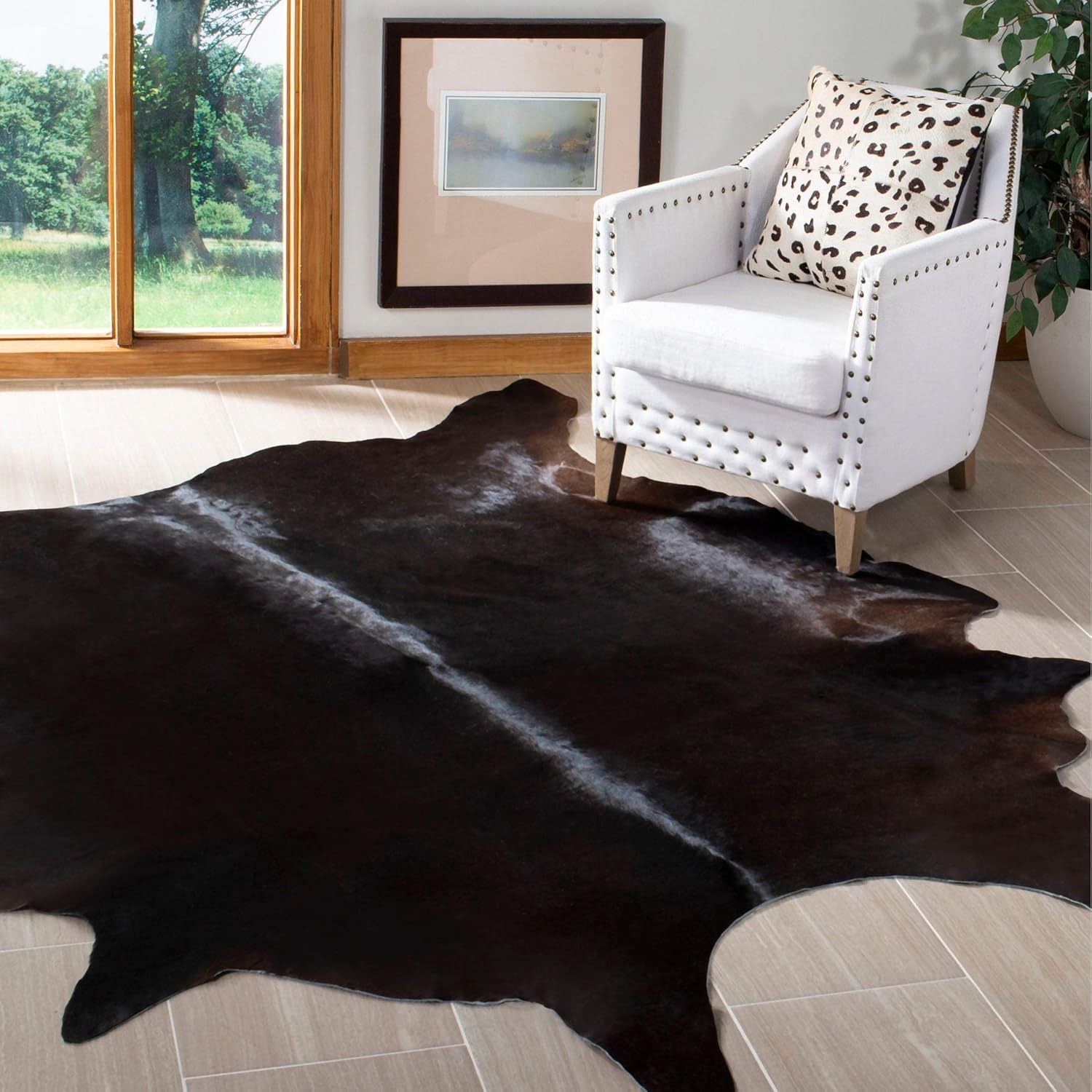 SAFAVIEH Cow Hide Collection – Alfombra decorativa de 4 pies 7 pulgadas x 5 pies 8 pulgadas, color negro y marrón, hecho a mano rústico de piel de