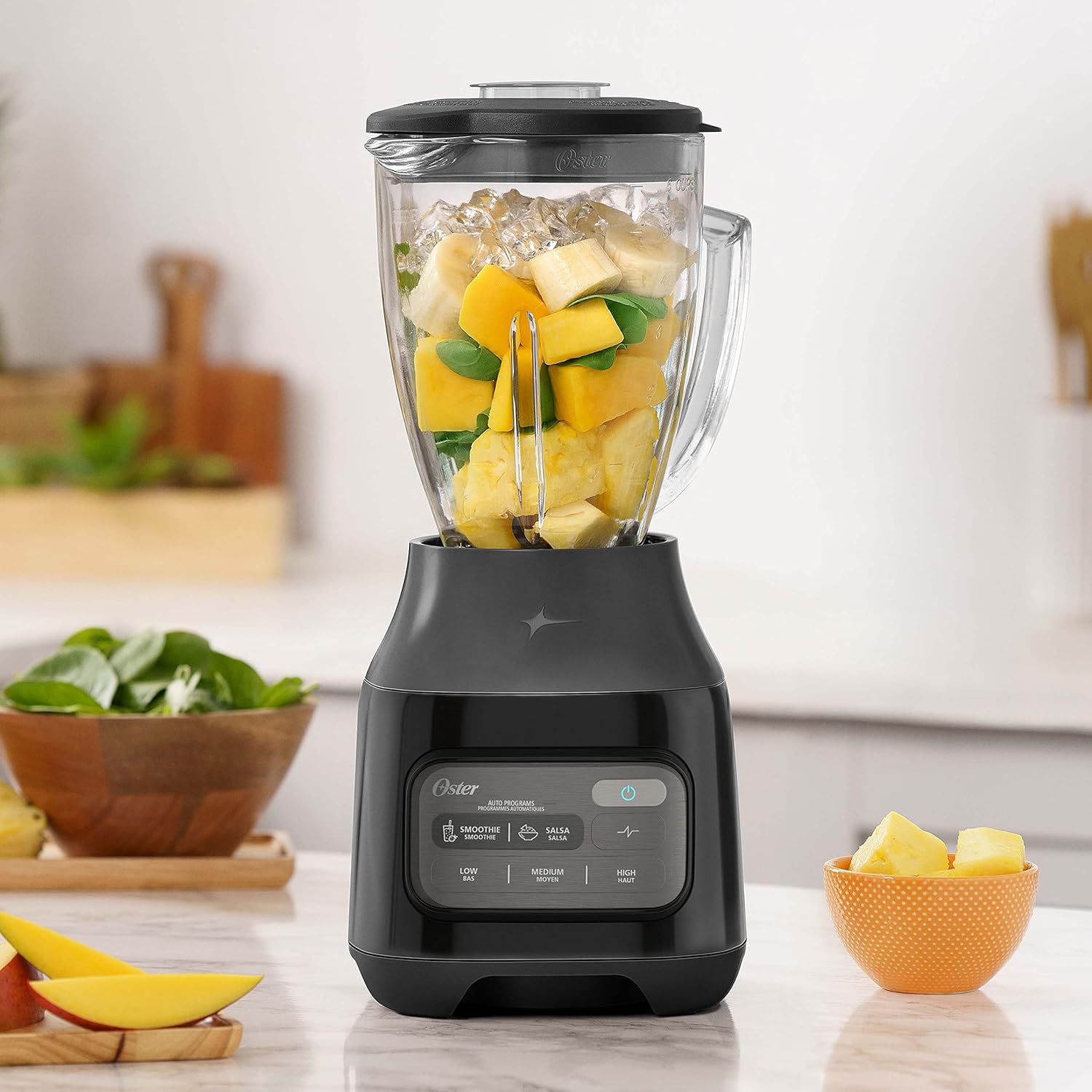 Oster Licuadora de un toque de 800 vatios y 6 tazas con programa automático en negro