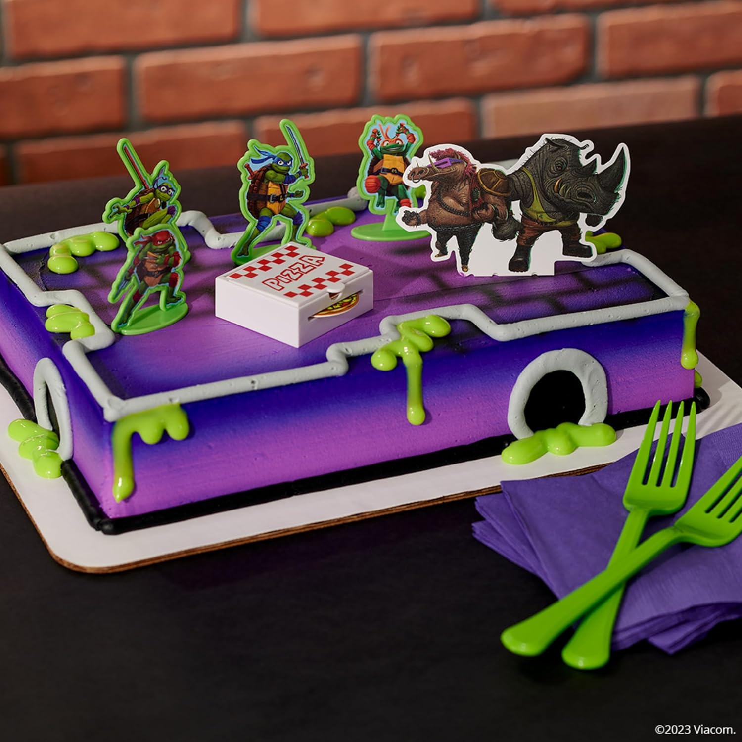 DecoSet Teenage Mutant Ninja Turtles Pizza Power Cake Topper, decoración de pastel de 6 piezas con figuras de tortuga, foto de pastel y lanzador de