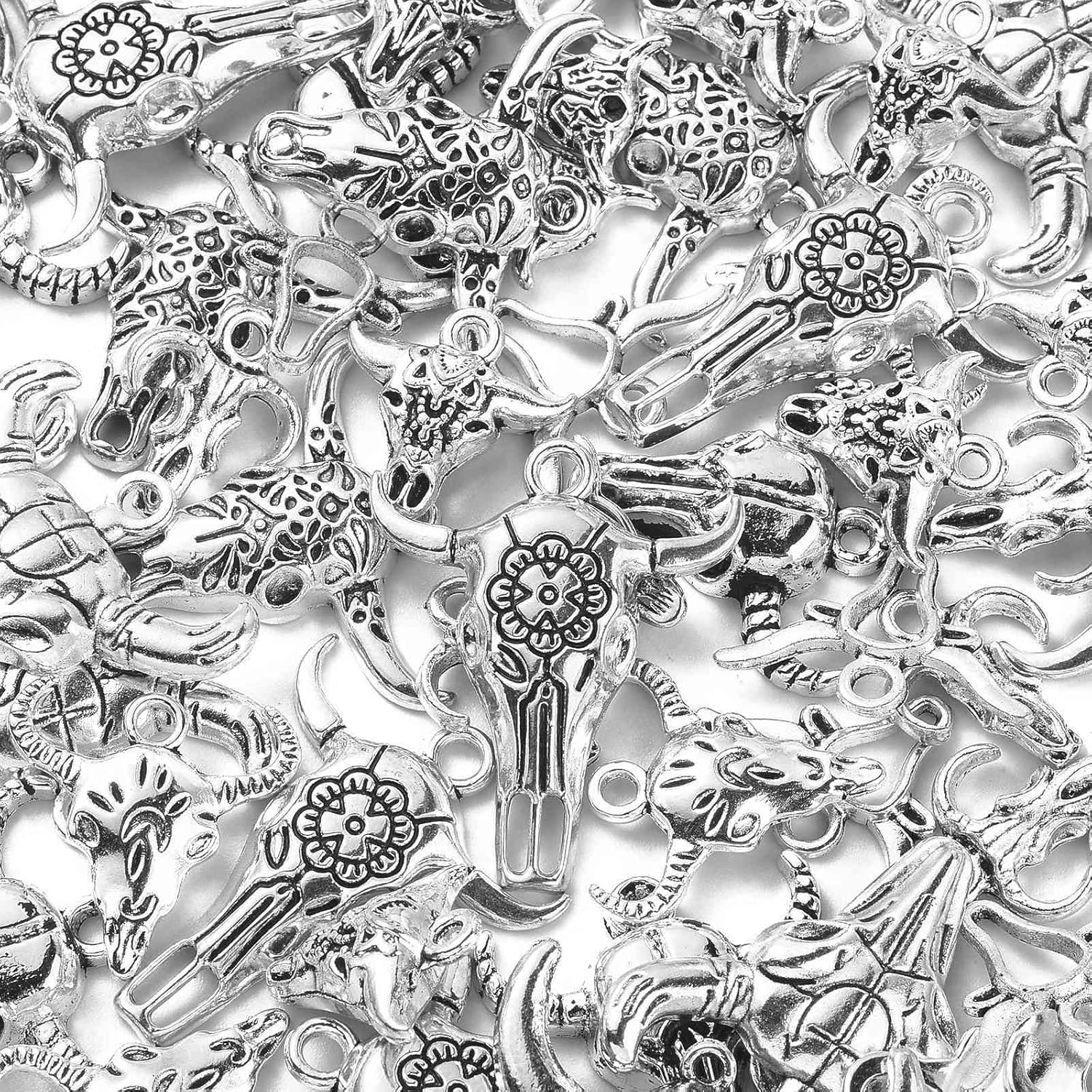 KitBeads 100 dijes de cabeza de ganado tibetano, estilos mixtos, dijes de calavera de ganado, dijes de calavera de vaca de plata antigua para hacer