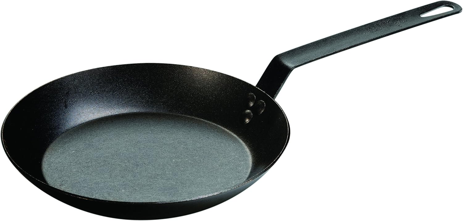 Lodge – Sartén de acero para carbón con manija de soporte de silicona y color naranja, NegroAnaranjado
