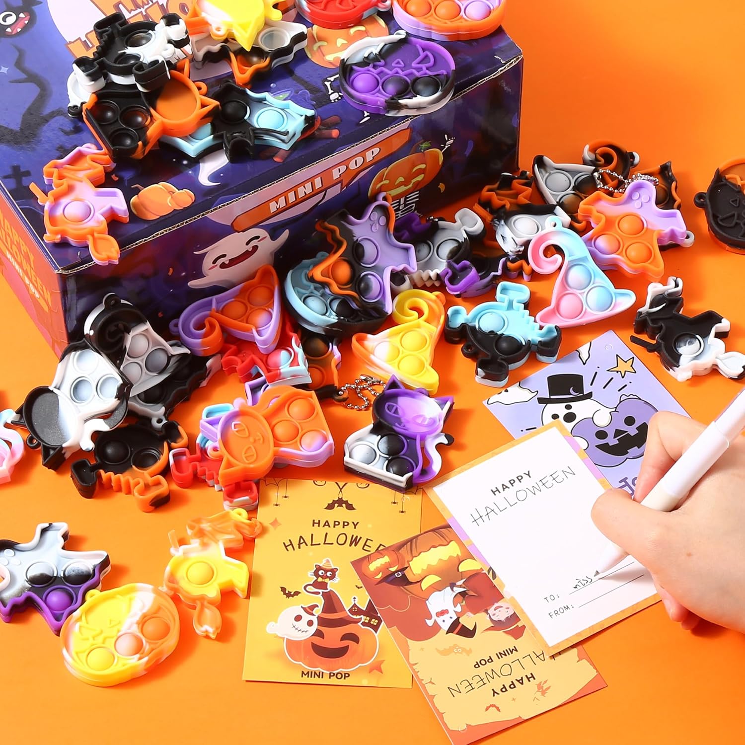 Mini juguete para ansiedad de Halloween, suministros de recuerdos de fiesta de Halloween, mini llavero para reventar, bolsas de regalo, alivio del