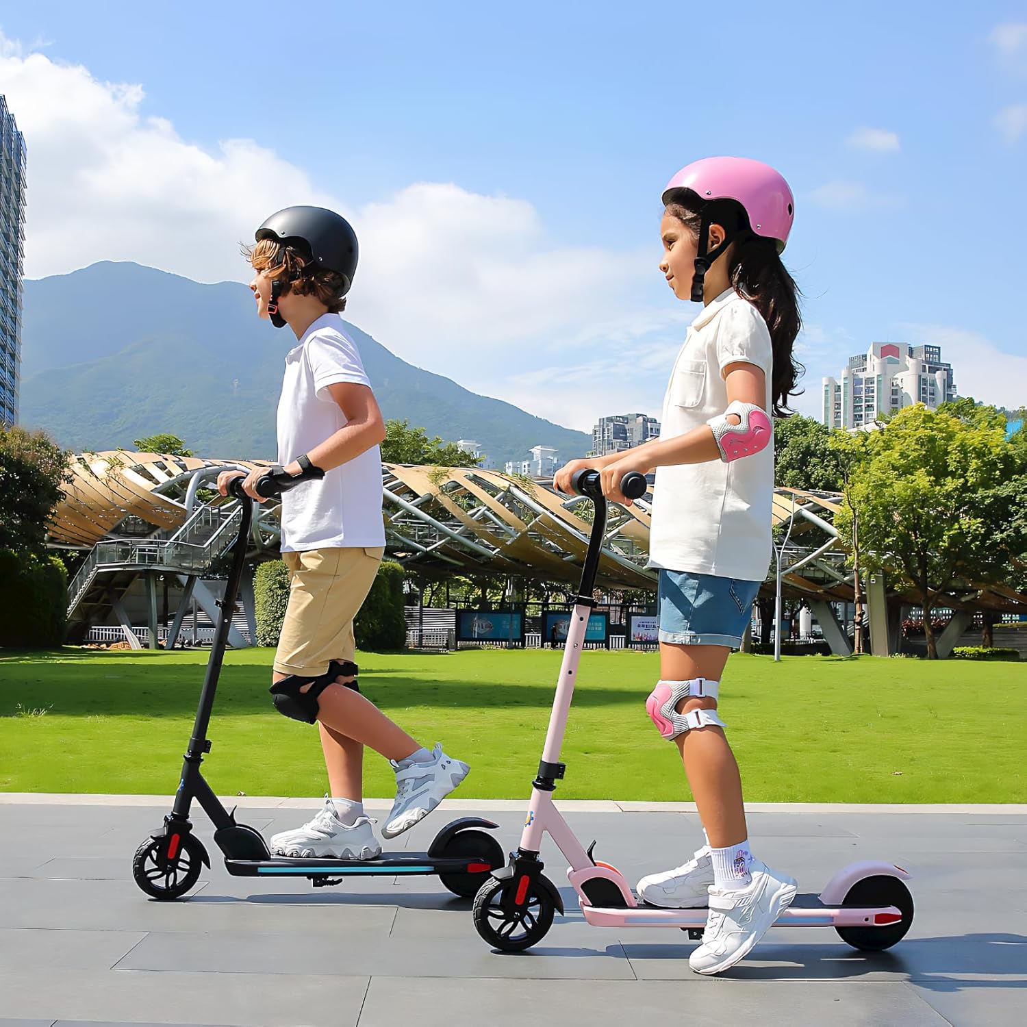 Caroma Patinete eléctrico E32E35 para niños, altura y velocidad ajustables, motor de 150 W, scooter eléctrico para niños de 6 a 12, 10 Mph y 7