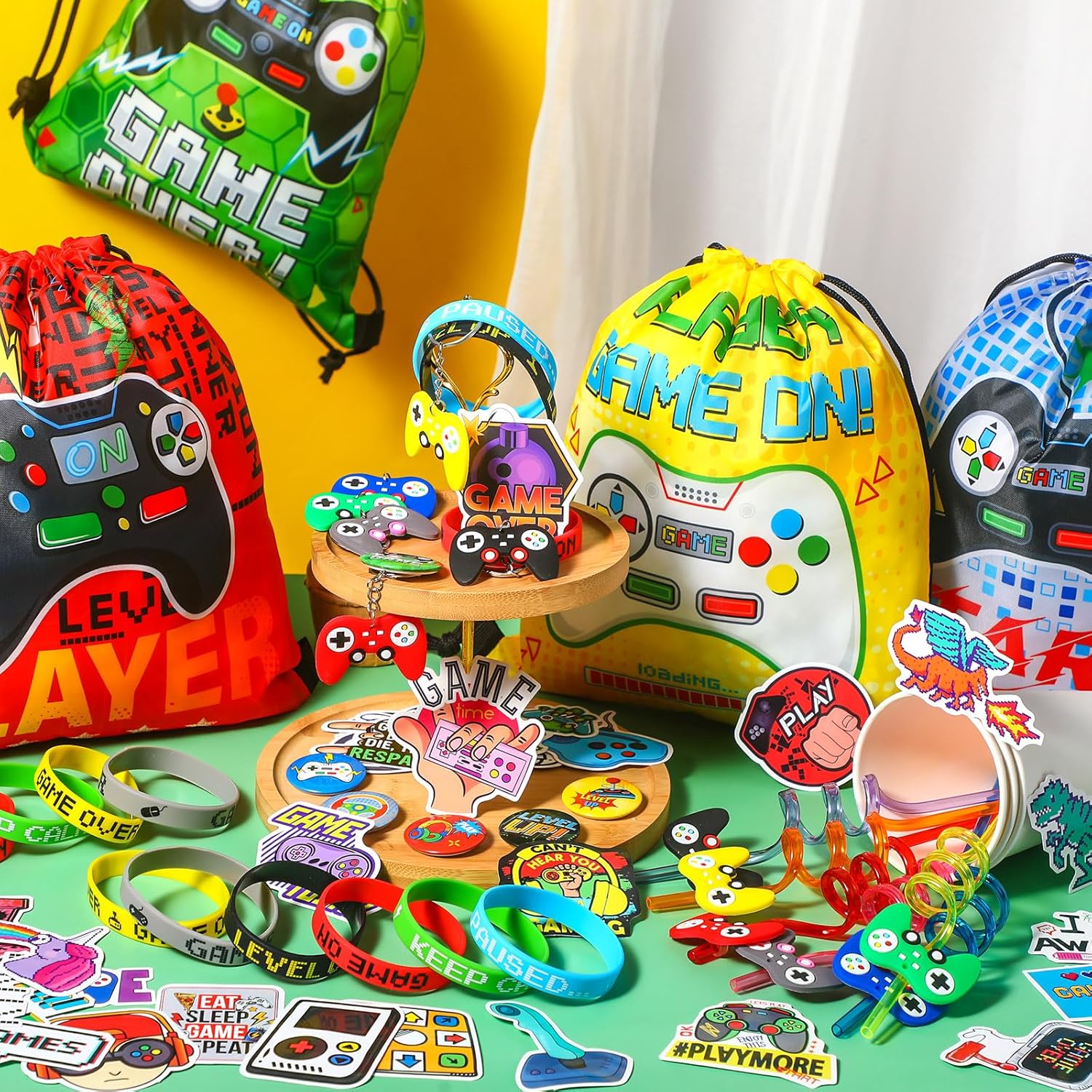 Sadnyy 140 piezas de regalos de fiesta de videojuegos, béisbol, fútbol, baloncesto, suministros para fiestas, bolsas con cordón con pulsera de