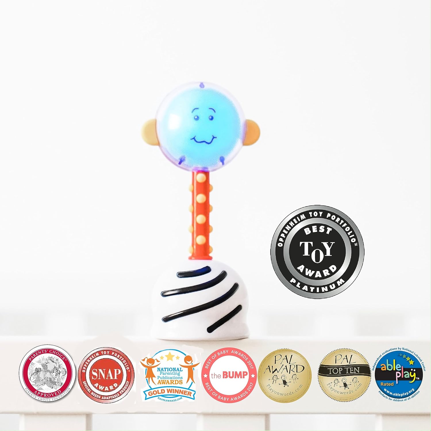 SmartNoggin Juego de hitos de desarrollo del bebé sonajero iluminado y anillos NogginStik para alcanzar y agarrar anillos