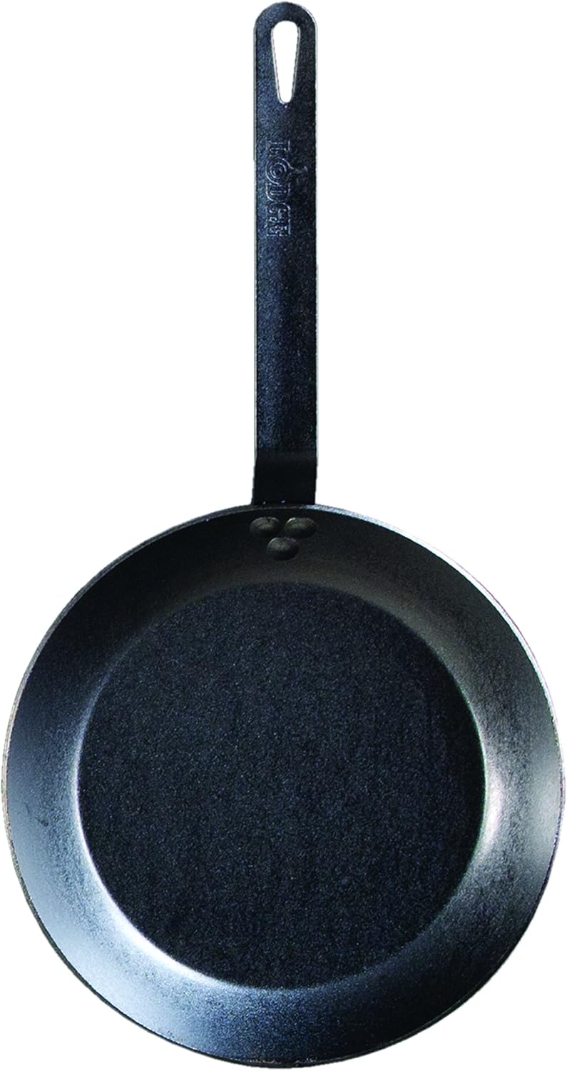 Lodge – Sartén de acero para carbón con manija de soporte de silicona y color naranja, NegroAnaranjado