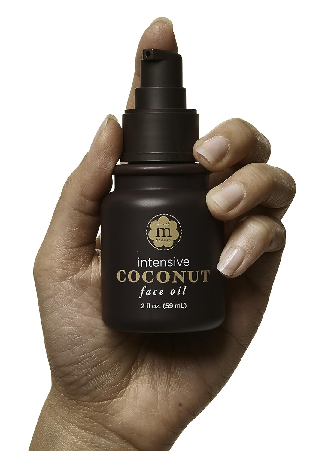 Aceite facial de coco que hidrata la piel y suaviza el aspecto de cicatrices y decoloración de la piel. 2oz.