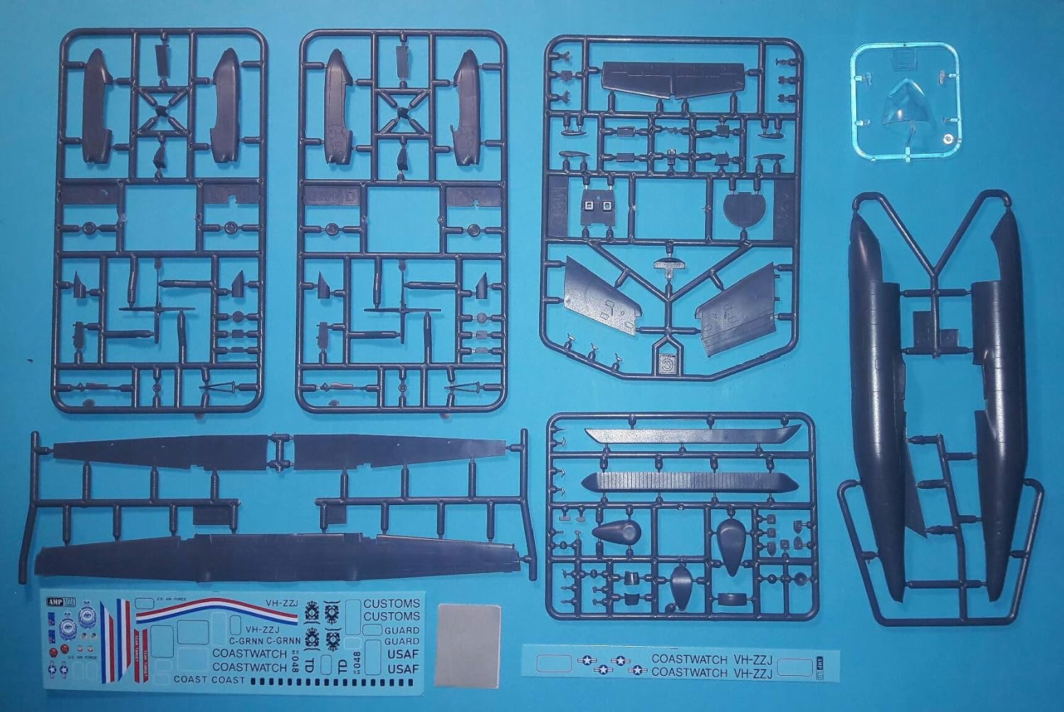 AMP 144-003 – 1144 – E-9A Widget DHC-8-106 Dash 8 Caribbean Coast Guard Model