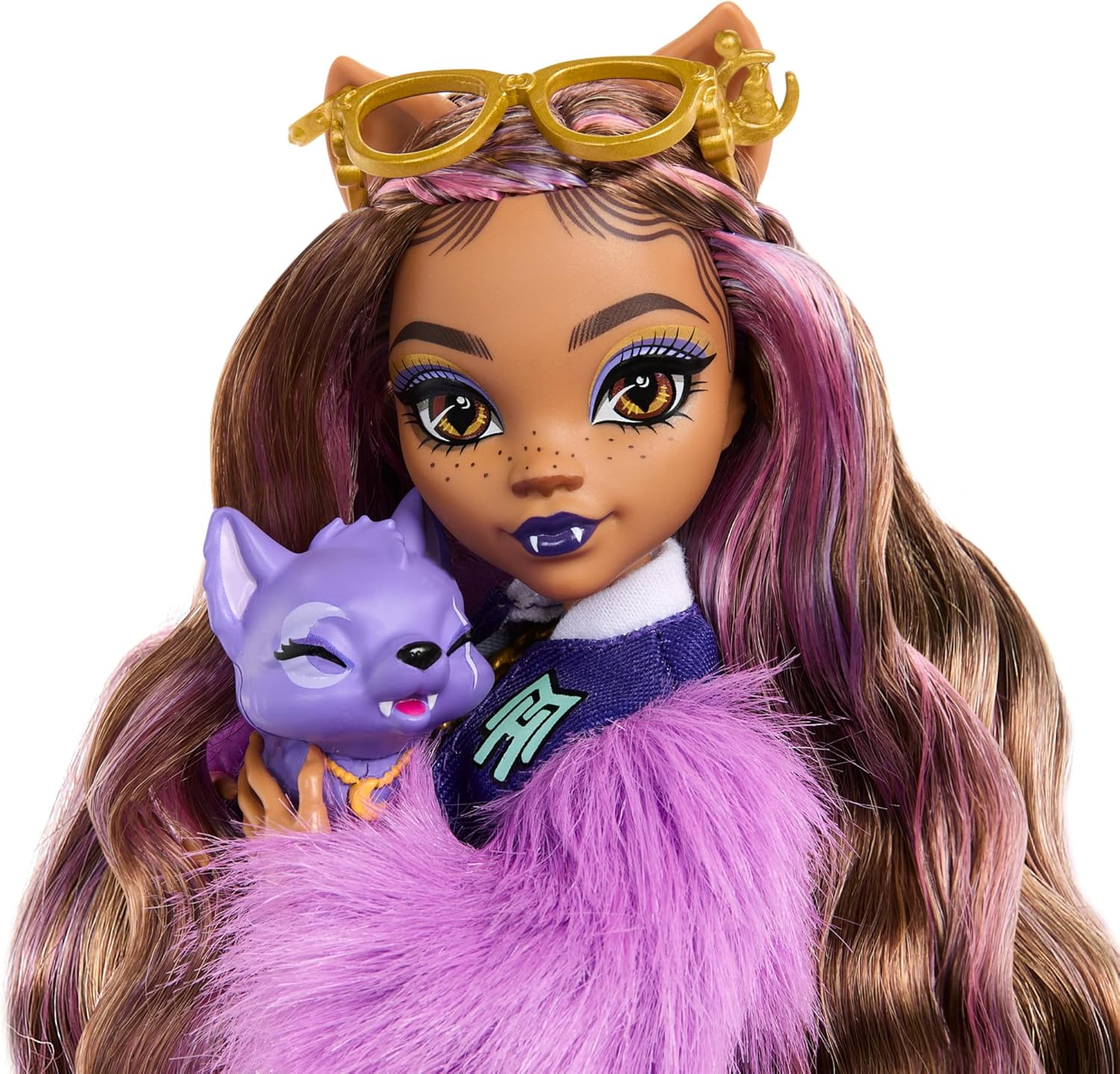 Monster High Muñeca Lobo Clawdeen con media luna de perro y accesorios como mochila, planificador, aperitivos y más