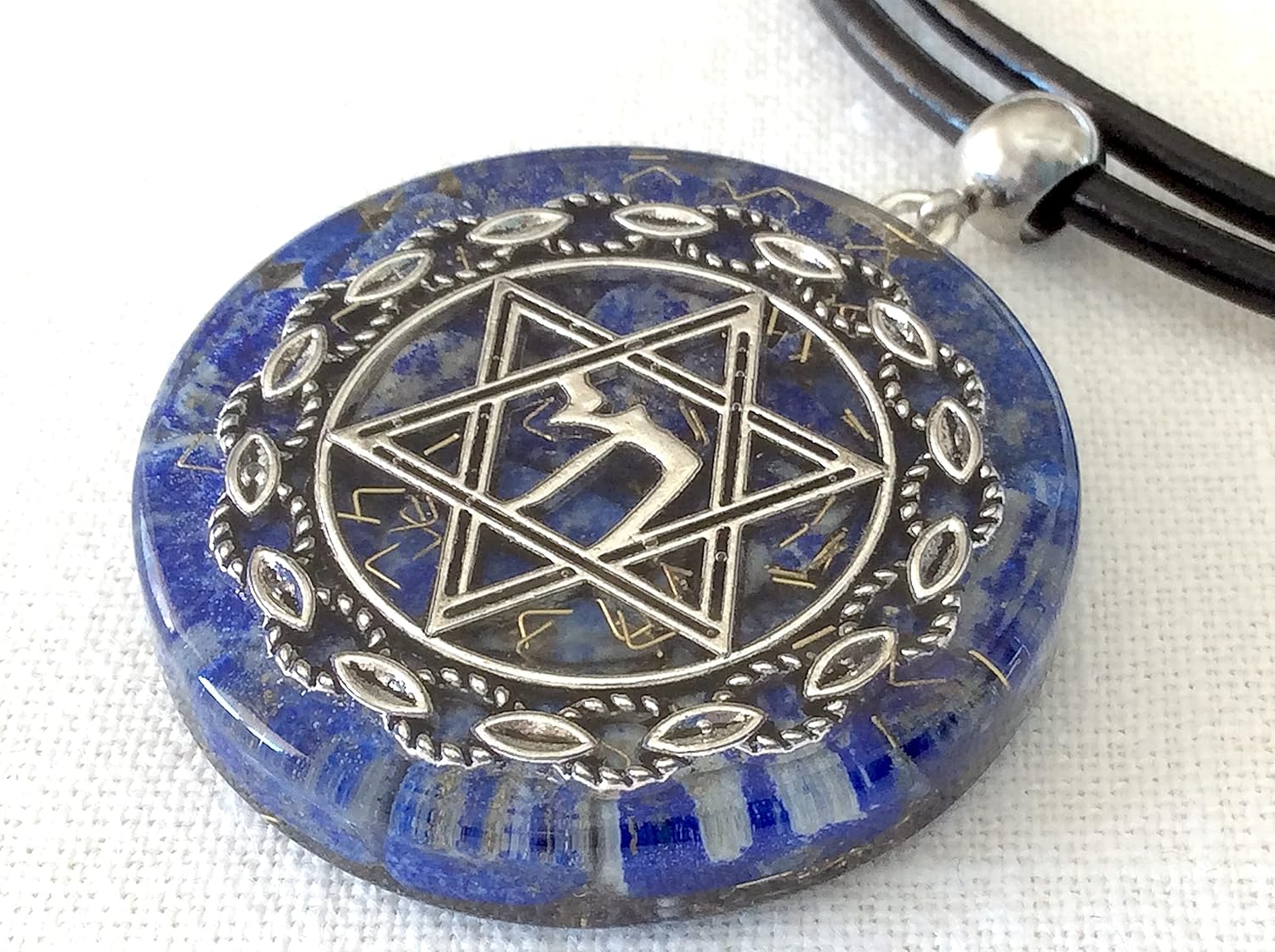 Orgone energy pendant necklace with Star of David Chai and Authentic Lapis Lazuli stones. 1.6 inch diameter. Made in USA
