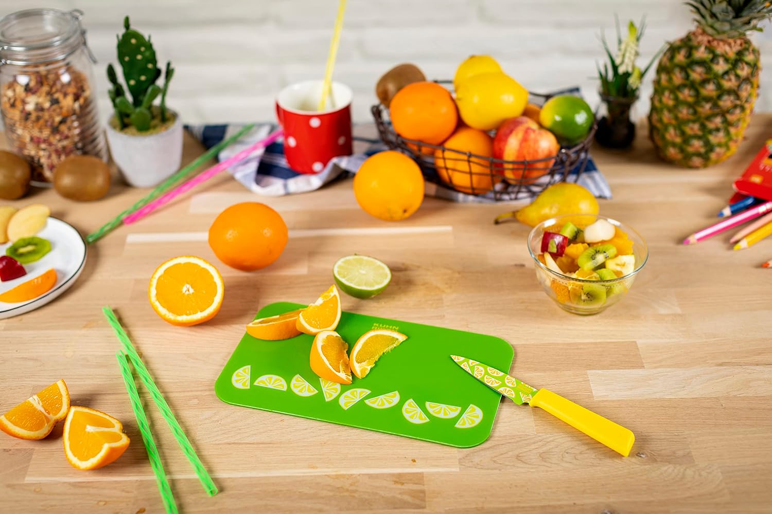 Kuhn Rikon Tabla de cortar y cuchillo de cítricos