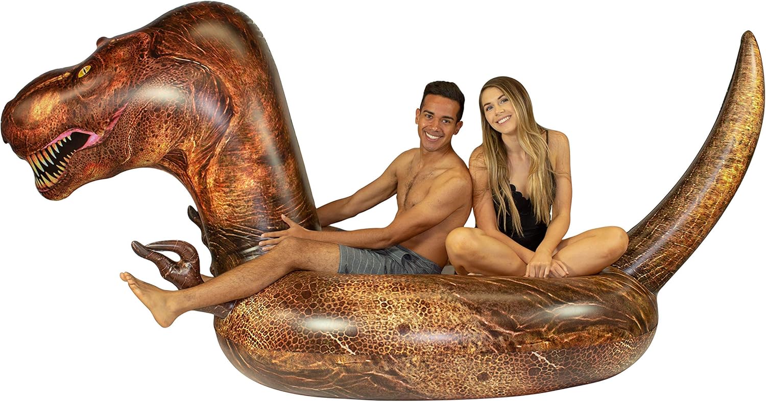 PoolCandy Balsa inflable gigante de dinosaurio T-Rex – Este dinosaurio prehistórico King transportará fácilmente a 3 adultos todo el día y la noche,