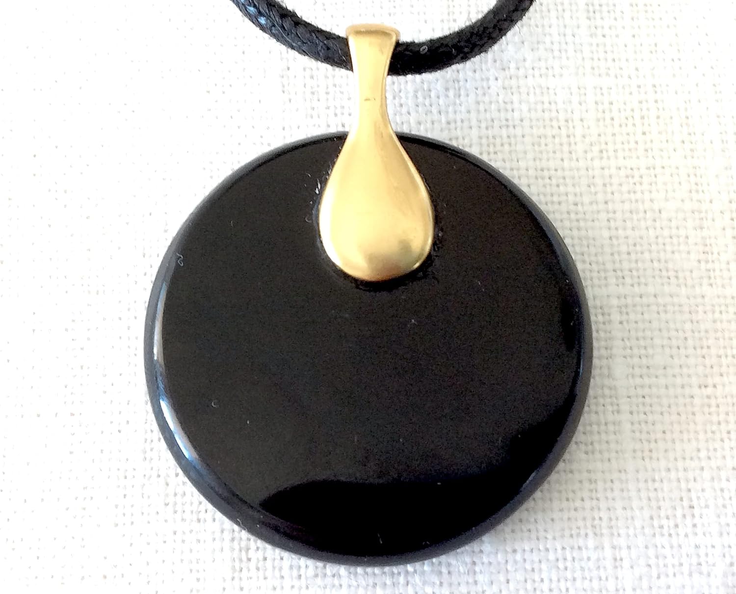 Orgone pendant necklace with golden Star of David, Turquoise & Black Tourmaline stones. Made in USA