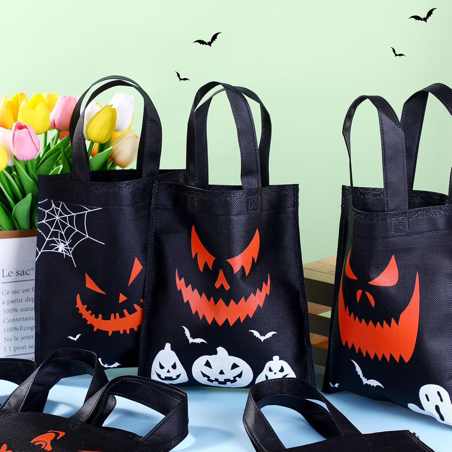 Toulite Paquete de 24 bolsas no tejidas de Halloween con asa a granel, reutilizables, bolsas de regalo de dulce o truco, calabaza, fantasma, araña,