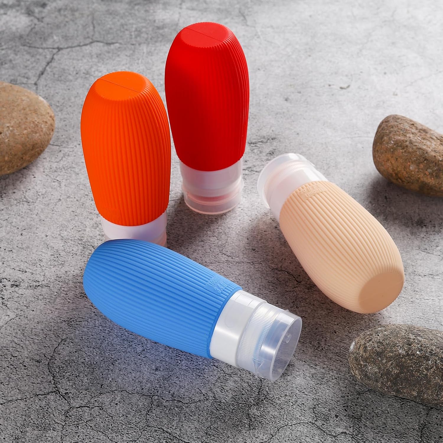 Botellas de viaje de silicona exprimibles aprobadas por la TSA de 3.4 onzas, a prueba de fugas, recipientes sin BPA para champú, acondicionador,