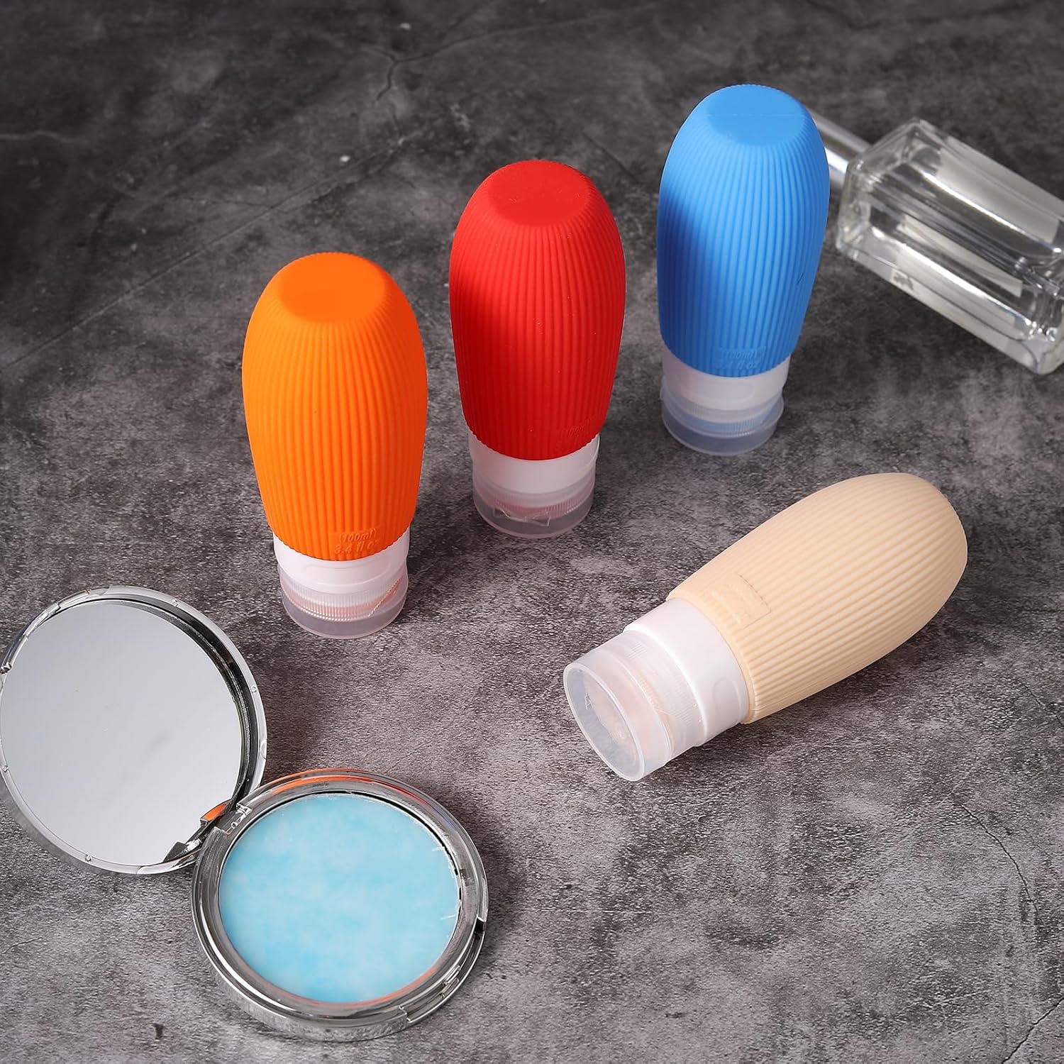 Botellas de viaje de silicona exprimibles aprobadas por la TSA de 3.4 onzas, a prueba de fugas, recipientes sin BPA para champú, acondicionador,