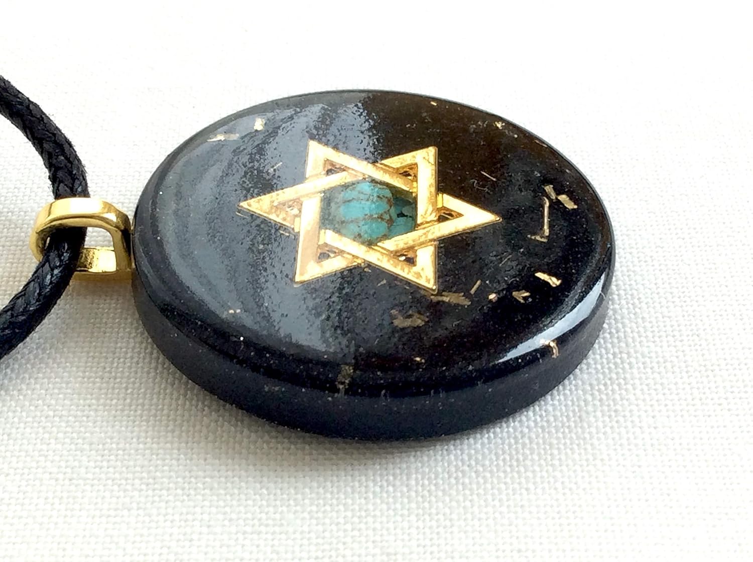 Orgone pendant necklace with golden Star of David, Turquoise & Black Tourmaline stones. Made in USA