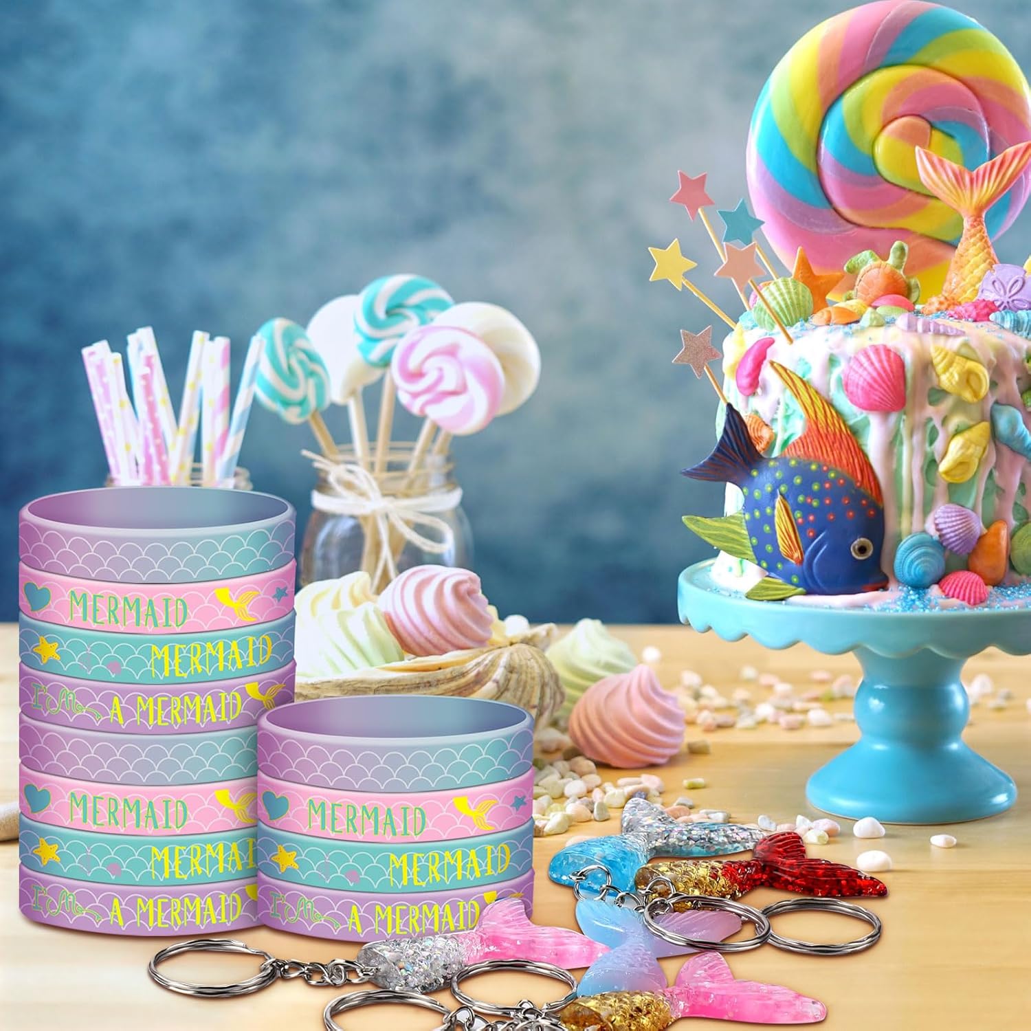 Aoriher Juego de 48 piezas de recuerdos de fiesta de sirena, 24 pulseras de silicona de sirena y 24 llaveros de cola de sirena con purpurina para