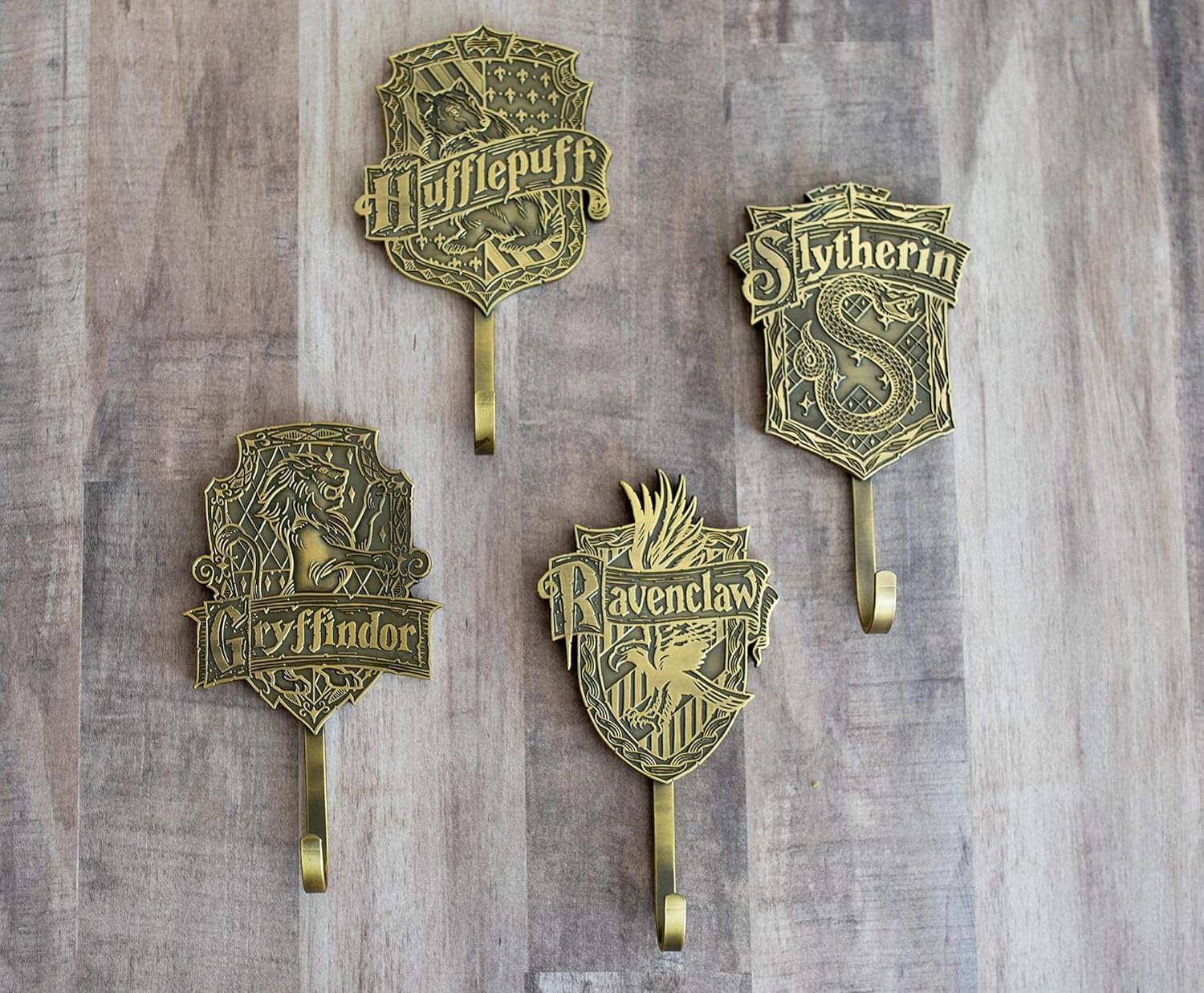 Harry Potter Hogwarts Houses – Estante de almacenamiento de ganchos de pared  Juego de 4