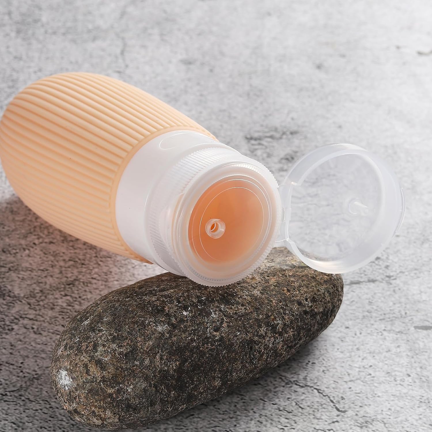 Botellas de viaje de silicona exprimibles aprobadas por la TSA de 3.4 onzas, a prueba de fugas, recipientes sin BPA para champú, acondicionador,
