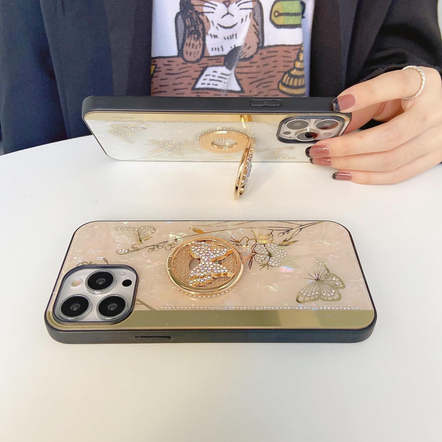 AmazFCCY Funda con función atril para iPhone 15 Pro Max de 6.7 pulgadas, bonita mariposa 3D con diamantes de imitación de lujo con purpurina