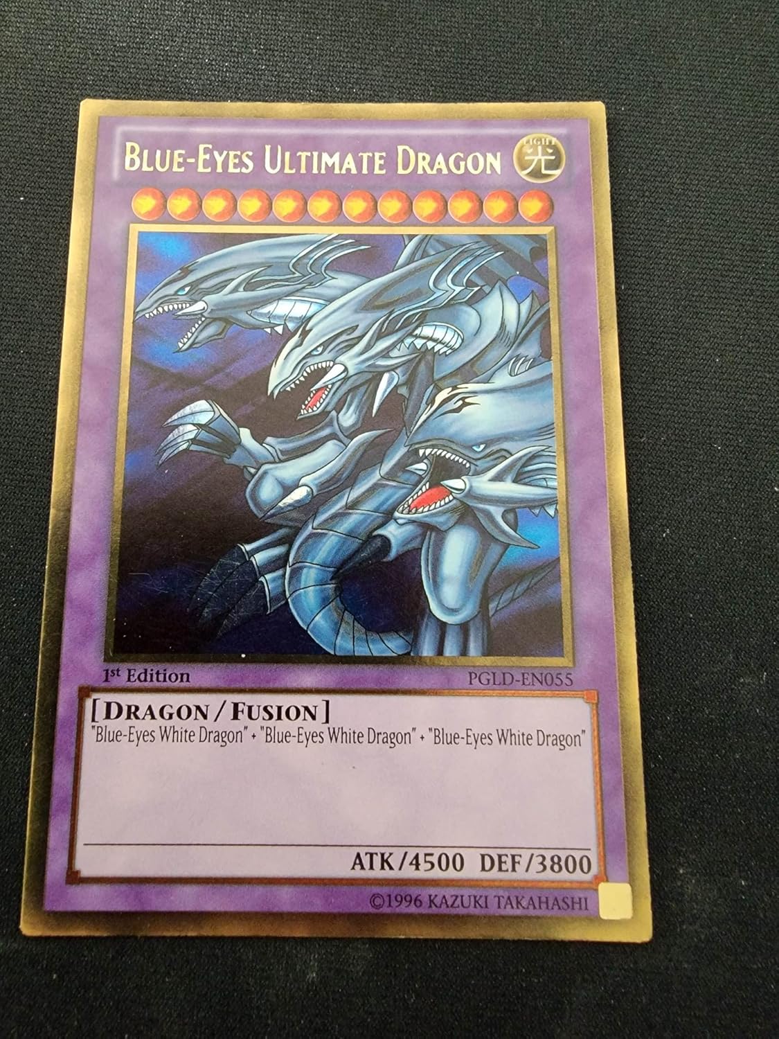 Blue-Eyes Ultimate Dragon – PGLD-EN055 – Premium Gold – 1 edición