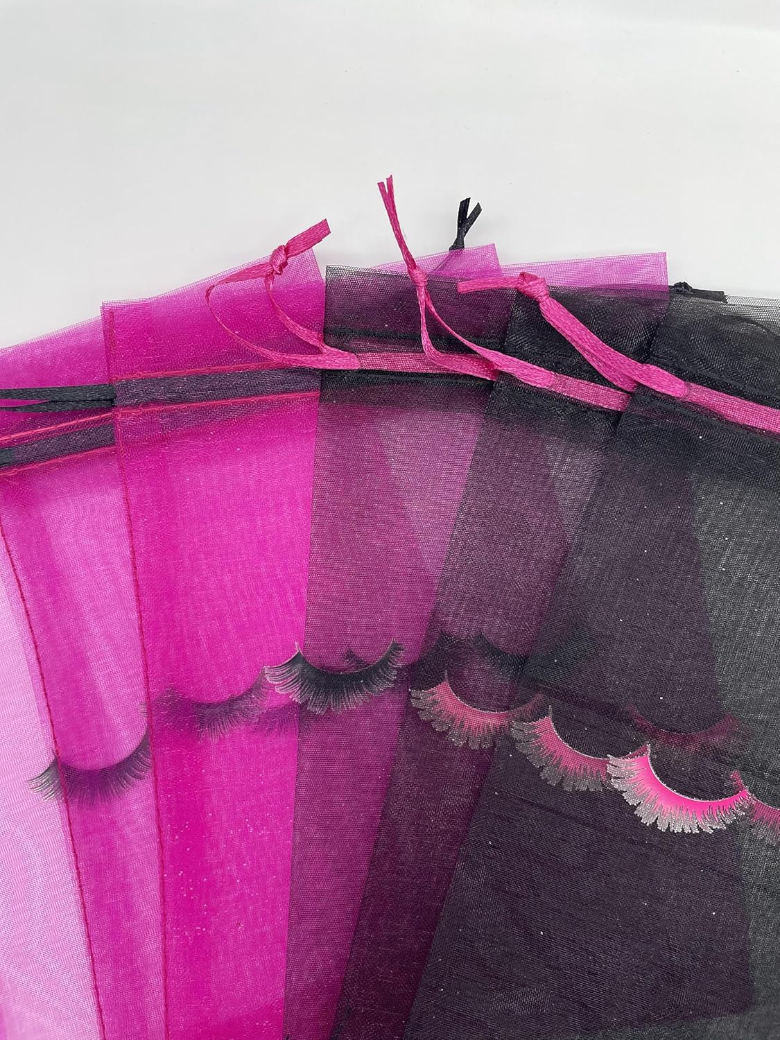 Jexila Paquete de 100 bolsas para cuidado posterior de pestañas, malla negra, con cordón, bolsa de maquillaje, pequeña bolsa de regalo para muestras