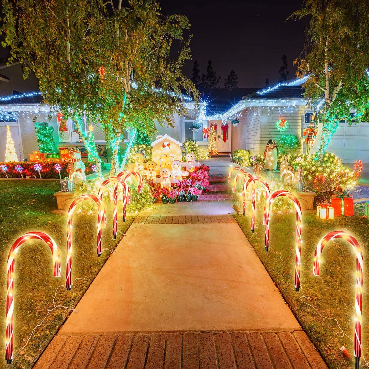 12 luces solares de bastón de caramelo de Navidad de 17 pulgadas, marcadores de camino de bastón de caramelo, impermeables, luces de paisaje al aire