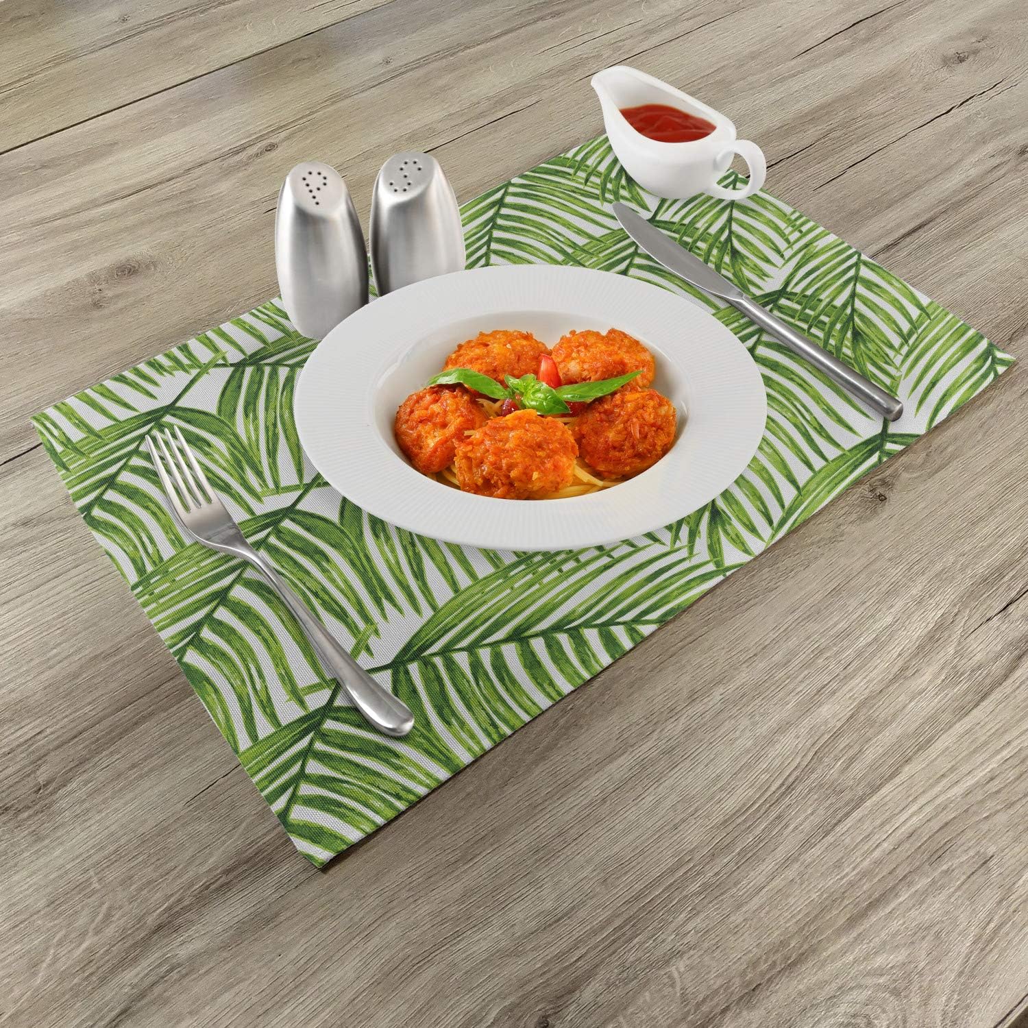 Ambesonne Juego de 4 manteles individuales para plantas, hojas fascinantes en ramas, diseño exótico, arreglo floral verde con temática de selva,