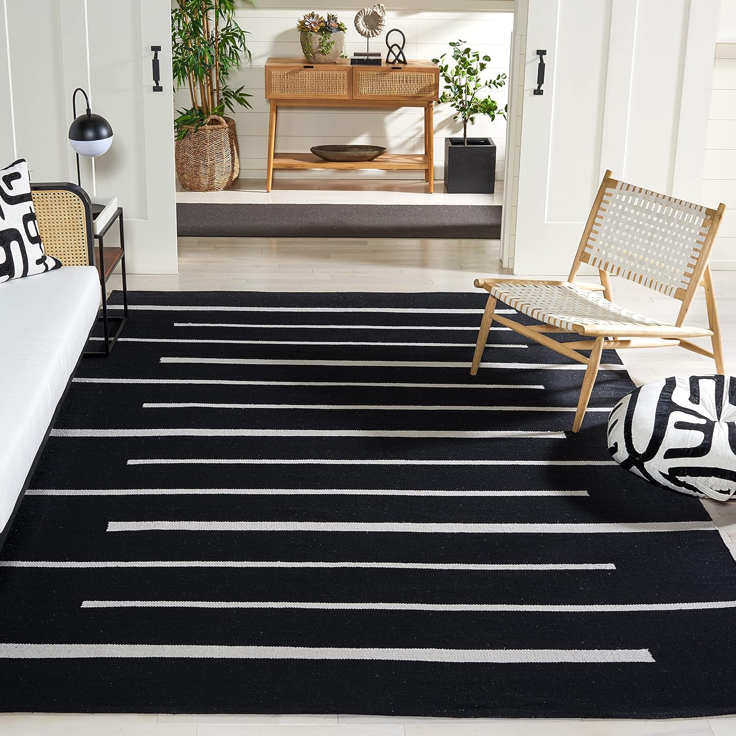 SAFAVIEH Montauk Collection – Alfombra de área de 9 x 12 pies, color negro y marfil, tejido plano bohemio hecho a mano de algodón a rayas modernas,