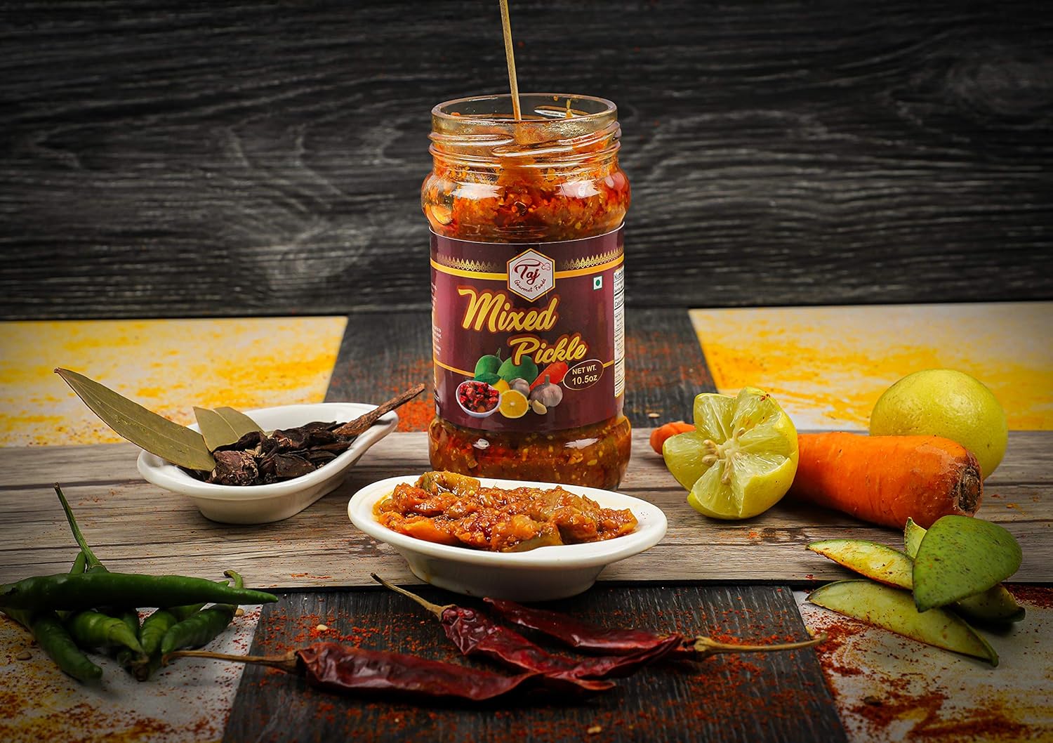 TAJ Pepinillo Mixto  Achar Mixto  Trozos de zanahoria con mango y lima  (10.58 oz)