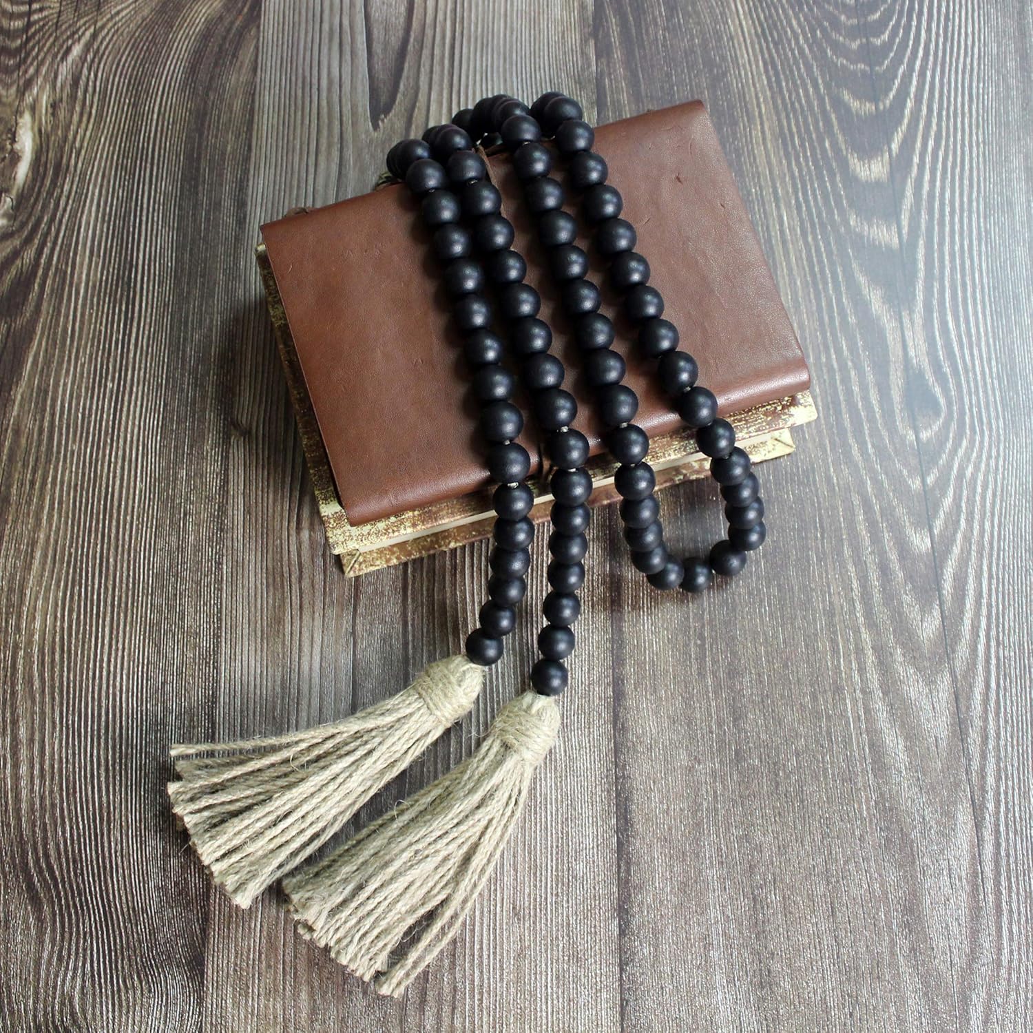 CVHOMEDECO. Guirnalda de cuentas de madera con borlas de madera rústica para decoración de festivales en el hogar, color negro
