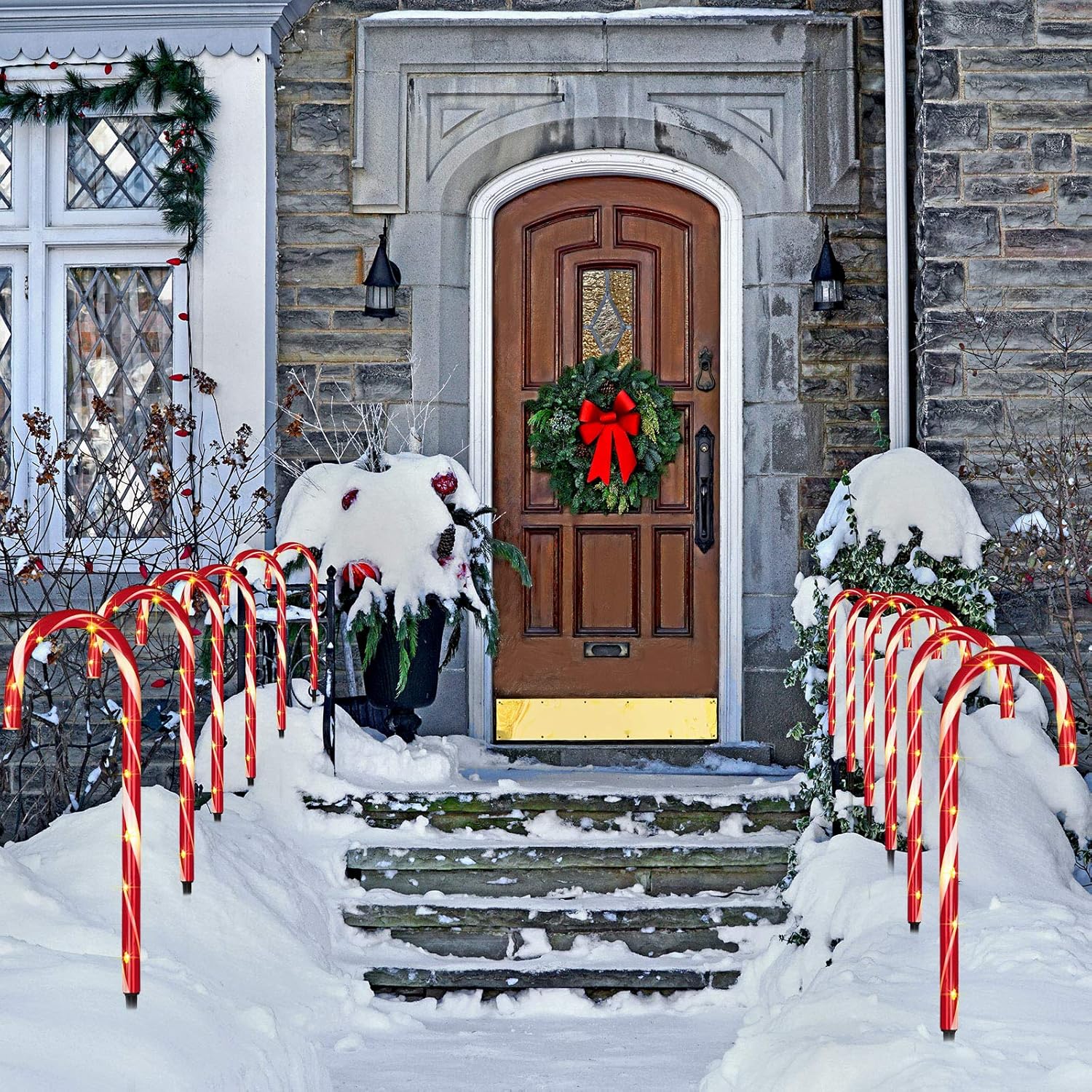 12 luces solares de bastón de caramelo de Navidad de 17 pulgadas, marcadores de camino de bastón de caramelo, impermeables, luces de paisaje al aire