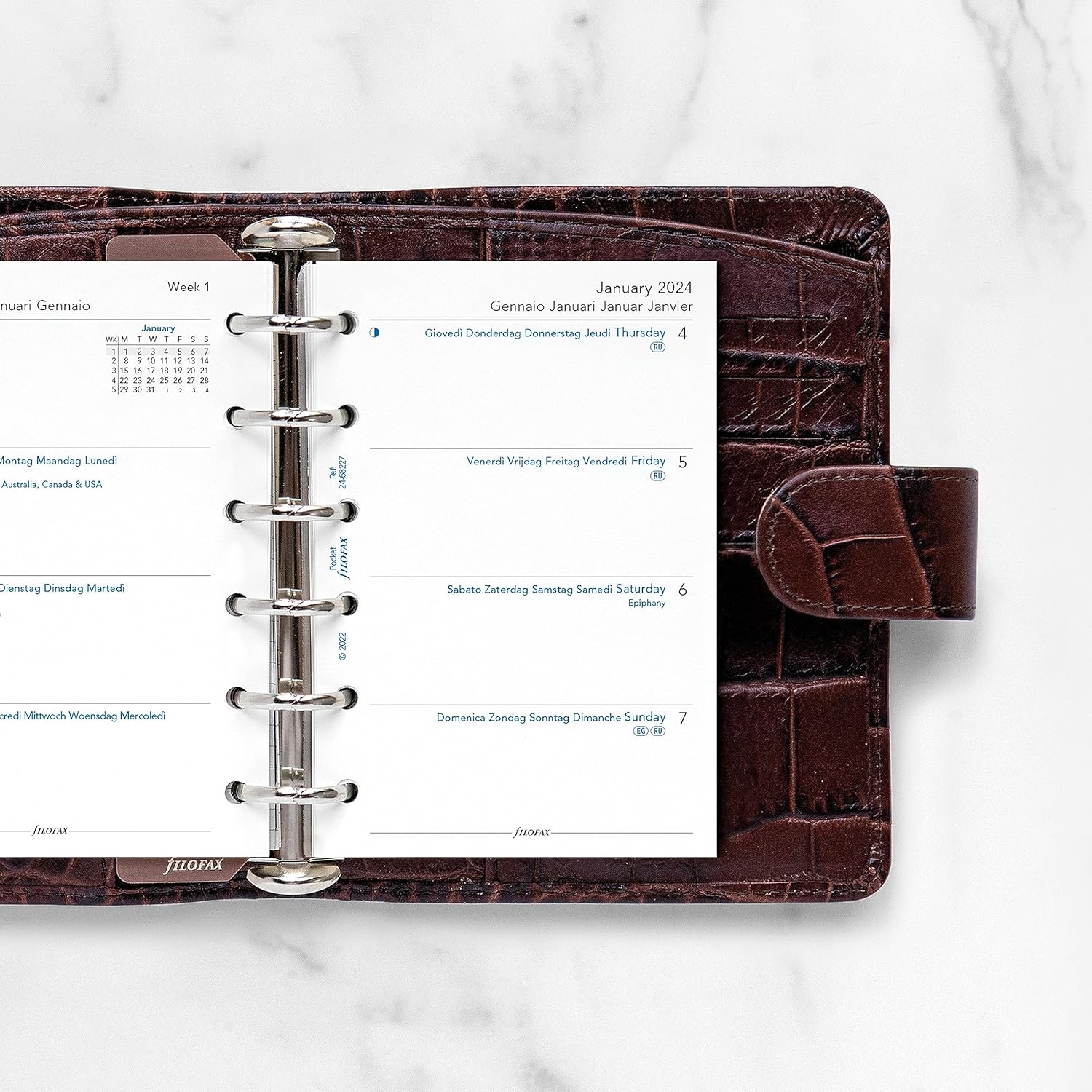 Filofax Recambio de diario de calendario, tamaño de bolsillo, semana a vista, libro blanco, sin rayas, multilingüe cinco idiomas, 2024 (C68227-24)