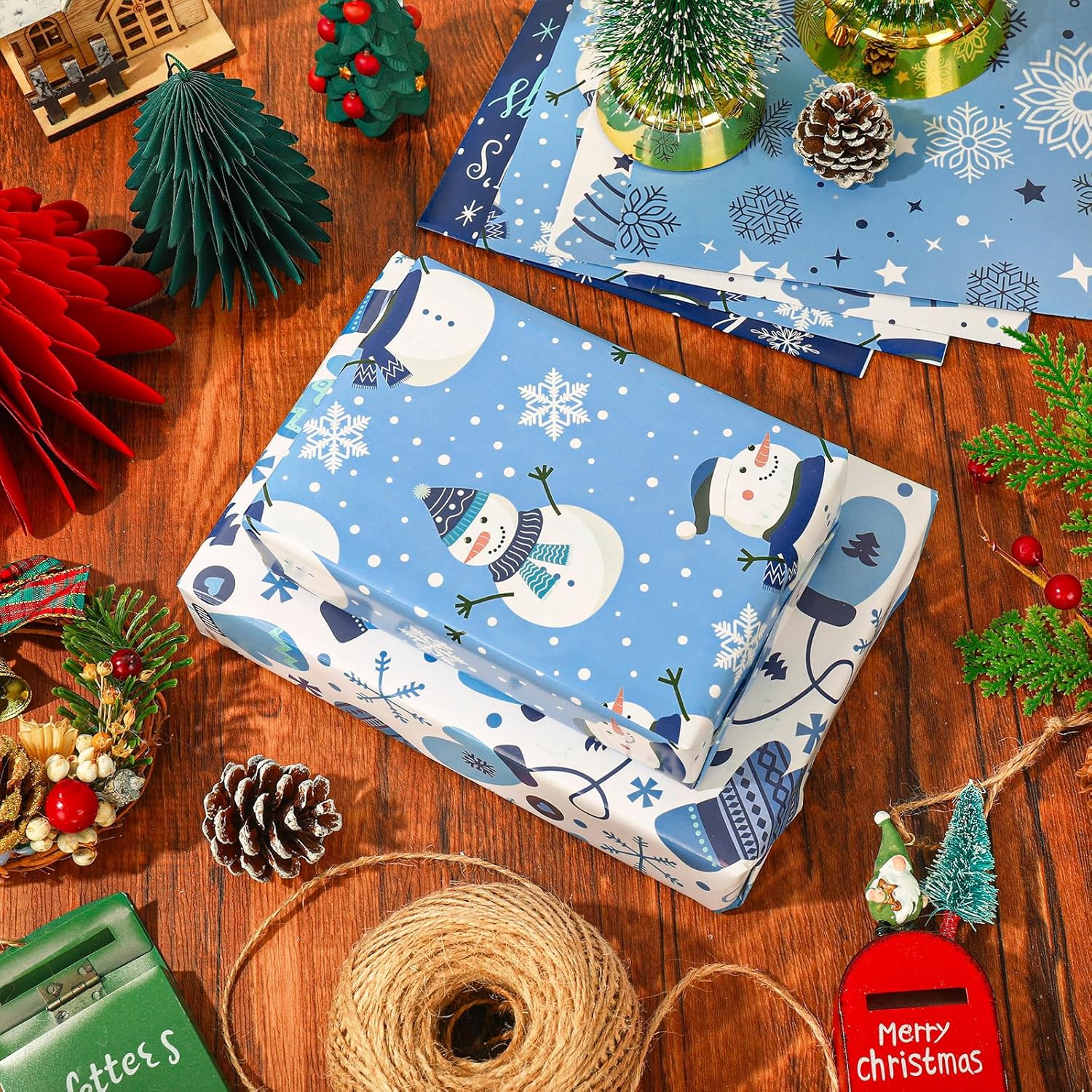 AnyDesign – 12 hojas de papel de regalo de Navidad, papel de regalo de invierno azul y blanco, copos de nieve a granel, papel de arte de árbol de