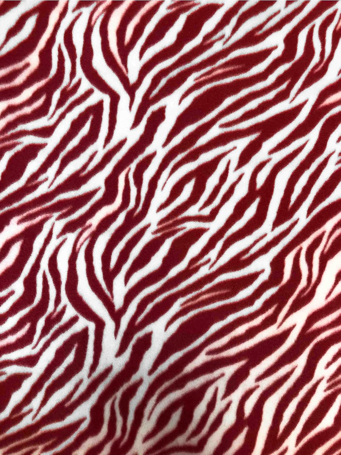 Tela polar con estampado animal rojo blanco cebra tela por The Yard