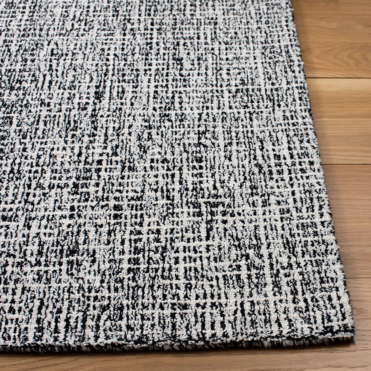 SAFAVIEH Abstract Collection – Alfombra decorativa, 2 x 3 pies, color negro y marfil, lana hecha a mano, ideal para zonas de alto tráfico en