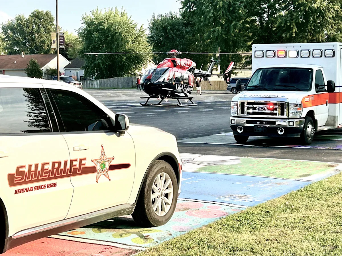 Teenage motorcyclist airlifted from high school parking lot after accident Teenage motorcyclist airlifted from high school parking lot after accident